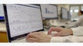 Scientist Analyzing Data on Multiple Screens Royalty Free Stock Photo