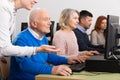 Focused senior man during computer classes Royalty Free Stock Photo