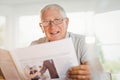 Focused senior man reading newspaper Royalty Free Stock Photo