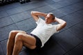 Focused senior man doing an ab workout in a gym Royalty Free Stock Photo