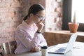 Focused serious doubtful businesswoman thinking of task. Royalty Free Stock Photo