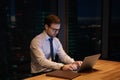 Focused serious young businessman working on computer. Royalty Free Stock Photo