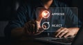 Man approving with digital interface on laptop computer for business solutions and applications Royalty Free Stock Photo