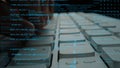 Close-Up Shot of Hands Typing on a Keyboard Surrounded by Lines of Code and Digital Elements in a High-Tech Environment Royalty Free Stock Photo