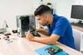 Focused technician checking the pc hardware Royalty Free Stock Photo