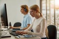 Focused university student using computer studying in computer room Royalty Free Stock Photo