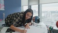 Focused woman writing paper remote workplace closeup. Architect drawing pencil Royalty Free Stock Photo