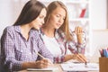 Focused women working on project Royalty Free Stock Photo