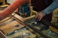 Focused woodworking on a machine. This scene captures the balance between technology and craftsmanship.