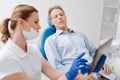 Focused worried man hearing doctors explanation