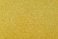 Focused yellow texture glitter background