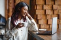 Focused young african american businesswoman or student looking at laptop, serious black woman working or studying with computer Royalty Free Stock Photo