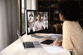 Focused young African American female employee holding video call meeting. Royalty Free Stock Photo