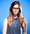 Focused young woman with nerd glasses, strict girl Royalty Free Stock Photo