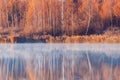 Fog above the lake at cold morning Royalty Free Stock Photo