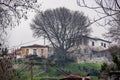 Fog above traditional houses in Milies village on mountain Pelion.Greece