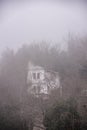 Fog above traditional houses in Milies village on mountain Pelion.Greece