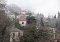 Fog above traditional houses in Milies village on mountain Pelion.Greece.