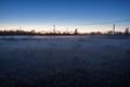 Fog in the Arctic tundra with power lines