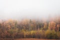 Fog and autumn colors in Andover, Maine Royalty Free Stock Photo