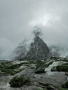 Fog in the background of majestic rocks Royalty Free Stock Photo