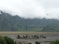 When the fog begins to descend at Pura Luhur poten at the foot of Mount Bromo Royalty Free Stock Photo