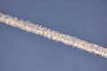 Fog or cloud cluster formed by an airplane in the sky, cloud clusters formed by planes flying in the sky Royalty Free Stock Photo