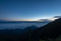 Fog and cloud mountain valley landscape on sunrise