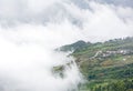 Fog and cloud mountain valley spring landscape.Forested mountain slope in low lying cloud Royalty Free Stock Photo