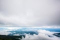 Fog and cloud mountain valley spring landscape.Forested mountain slope in low lying cloud Royalty Free Stock Photo