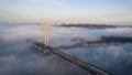 Fog is coming to the south bridge of Kiev, a warm autumn morning Royalty Free Stock Photo