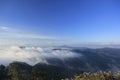 The fog cover the mountain below in the morning. Royalty Free Stock Photo