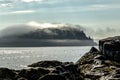 Fog rolling over Porcupine Island in Bar Harbor Maine