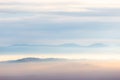 Fog filling a valley in Umbria Italy, with layers of mountains and hills Royalty Free Stock Photo