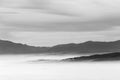 Fog filling a valley in Umbria Italy, with layers of mountains and hills Royalty Free Stock Photo