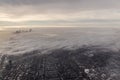 Chicago skyline popping up out of clouds in the winter Royalty Free Stock Photo