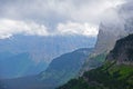 Fog lies around the mountains and valleys in Glacier. Royalty Free Stock Photo