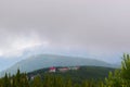 Fog and low clouds over mountains near Transalpina road DN67C. This is one of the most beautiful alpine routes in Romania Royalty Free Stock Photo