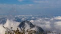 Fog and mist covering the valleys below, autumnal landscape, cold feeling.