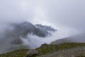 Fog over Bucegi mountain and a ray of light Royalty Free Stock Photo