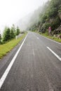 Fog over highway to mountains. Transfagarasan road. Romania Royalty Free Stock Photo