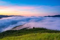 Fog over mountain and forest on sunrise Royalty Free Stock Photo