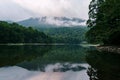 Fog over mountains near the lake in Biogradska Gora park. Montenegro Royalty Free Stock Photo