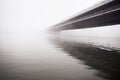Fog over the river and bridge Royalty Free Stock Photo
