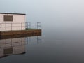 Fog over the river houseboat at sunset Royalty Free Stock Photo