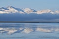 Fog over Son-Kul mountain lake early in the morning,central Tien Shan.Name translation is `the last lake`, Kyrgyzstan,Central Asi Royalty Free Stock Photo