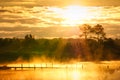 Fog over the water during sunrise Royalty Free Stock Photo