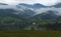 Fog and rain in the Carpathian mountains. Mountain village Dzembronya in the Carpathian mountains, Ukraine. Royalty Free Stock Photo