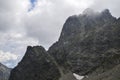 Fog and rain clouds over high mountain peaks of the ridge at High Tatras mountains Royalty Free Stock Photo