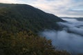 Fog rising on the mountains of the small Saar loop Royalty Free Stock Photo